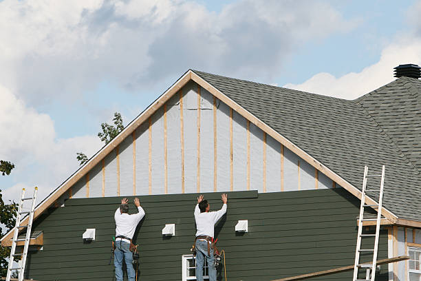 Professional Siding Replacement technician working in Lakewood, CO
